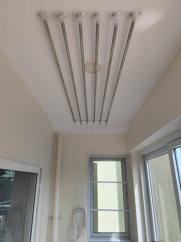 Stainless Steel Hanger — Modern Utility/Balcony Area