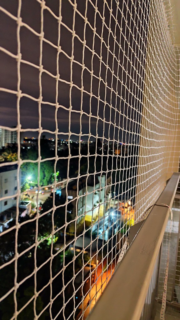 Balcony safety net night installation by Roy Enterprises